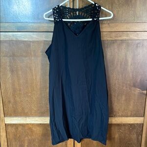 Elegant Black Sleeveless Dress with Crocheted Back Design